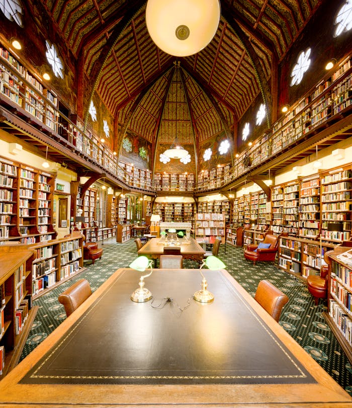 Explore the intricate and historic interior of Oxford Union Library, a renowned literary hub in England.
